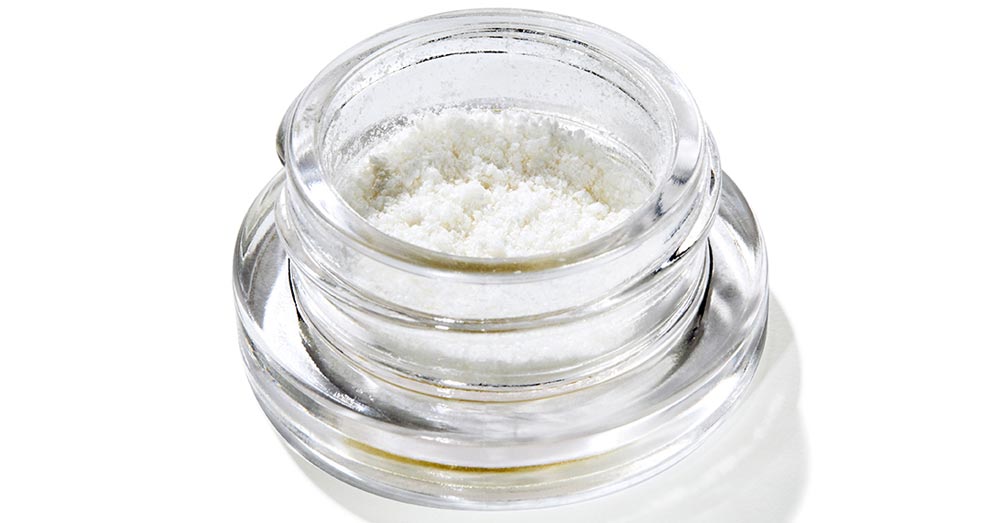 CBD Isolate in a glass container